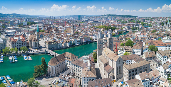 Beautiful aerial view of Zurich with its beautiful Churches in Switzerland on this warm summer day.