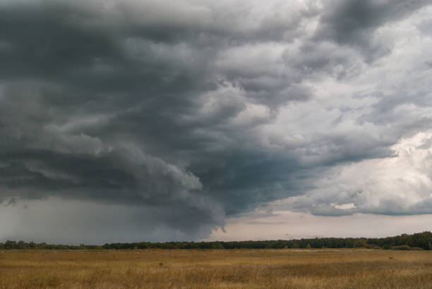 istock Storm cyclone over autumn fields and forests 801227570