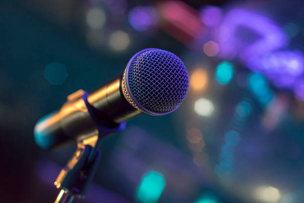 istock Music microphone close up focus with colorful background 801227772