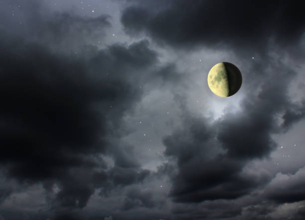 istock Moon glowing in the dark night sky 801231344