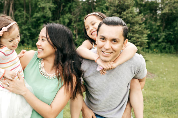 istock Happy family having fun outdoor 801236410