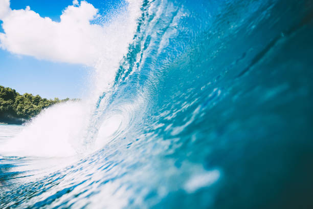 istock Blue wave in ocean. Clear wave and blue sky 801239180