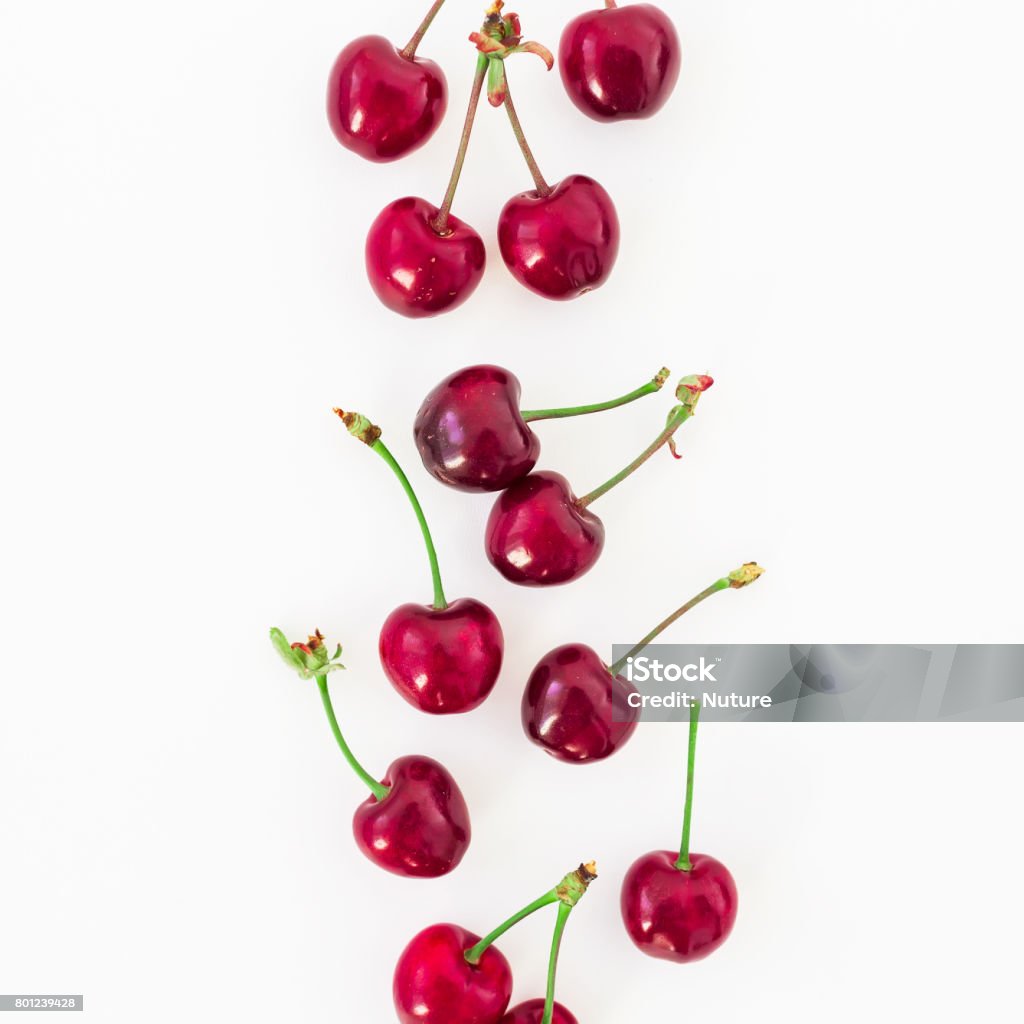 Juicy tasty cherries on white background. Flat lay. Top view. Red berries Cherry Stock Photo