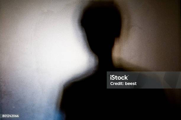 Person Shadows With Frosted Glass Violations Concept Stock Photo - Download Image Now