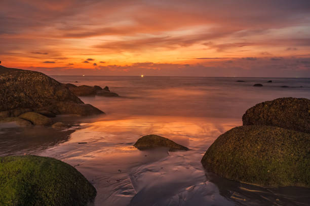 Sunset on tropical beach stock photo