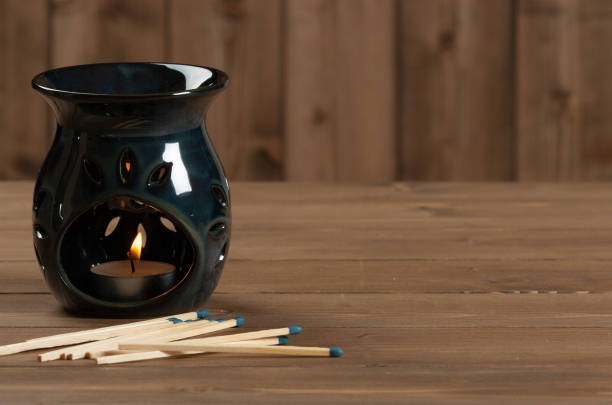 istock Aroma Lamp With Burning Candle. Aromatherapy. Spa Room. 801262746