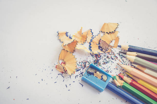 istock color pencil with sharpening shavings on white background,warm tone 801263982