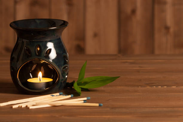 istock Aroma Lamp With Burning Candle. Aromatherapy. Spa Room. 801264064