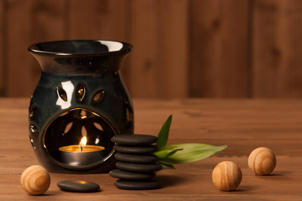 istock Aroma Lamp With Burning Candle. Aromatherapy. Essential Oil. Spa 801264246