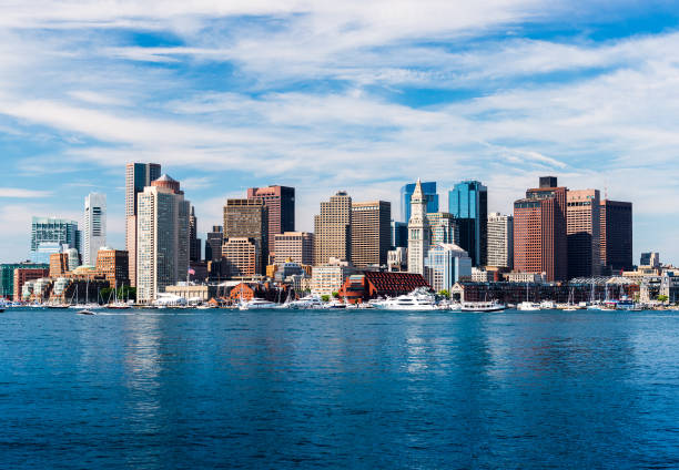 Panoramic view of Boston skyline, view from harbor, skyscrapers in downtown Boston, cityscape of the Massachusetts capital, USA stock photo
