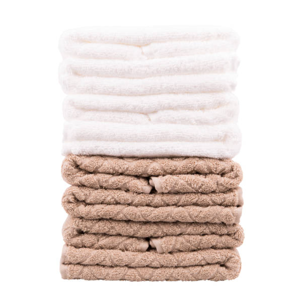 istock Stacks of beige and white towels isolated on a white background 801299724