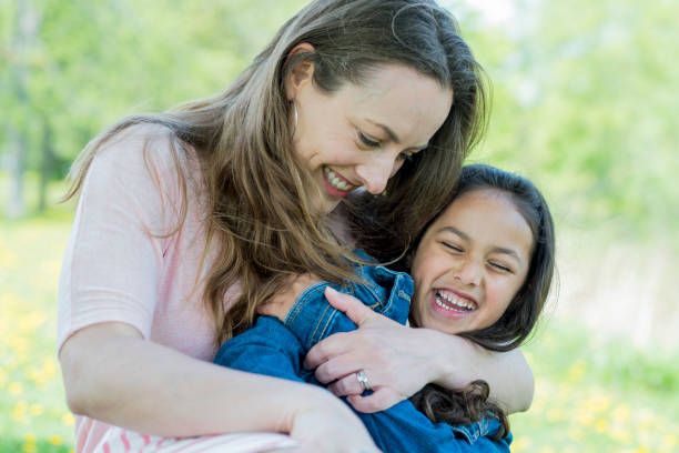 istock Mother and Daughter at the Park 801309802