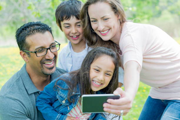 istock Family Selfie at the Park 801309852