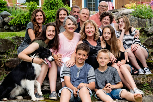 istock Real three generation family portrait outdoors in summer. 801309916