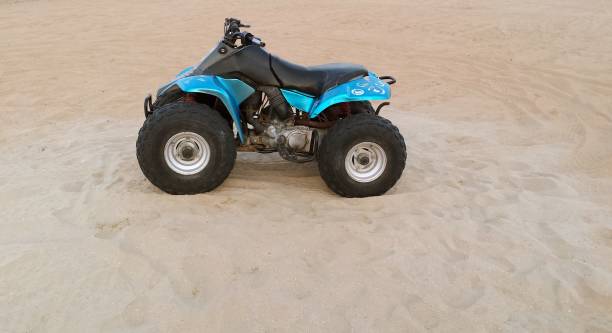 istock All Terrain Vehicle Buggy isolated in a desert 801309986
