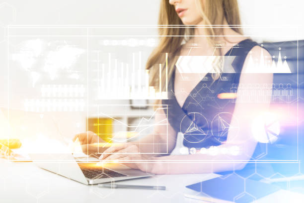 istock Woman with laptop, graphs and formulas 801310090