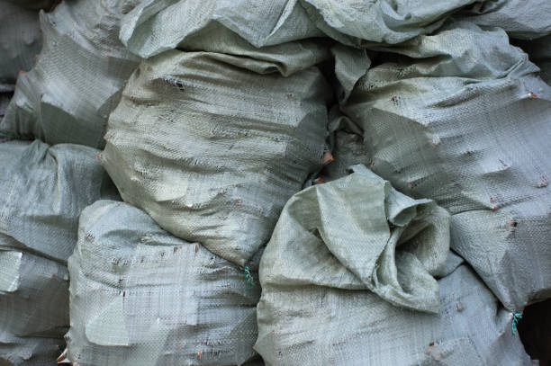 istock A pile of sacks with construction debris, carrying out repairs 801327112