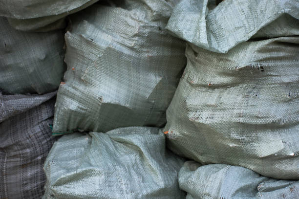 istock A pile of sacks with construction debris, carrying out repairs 801327124