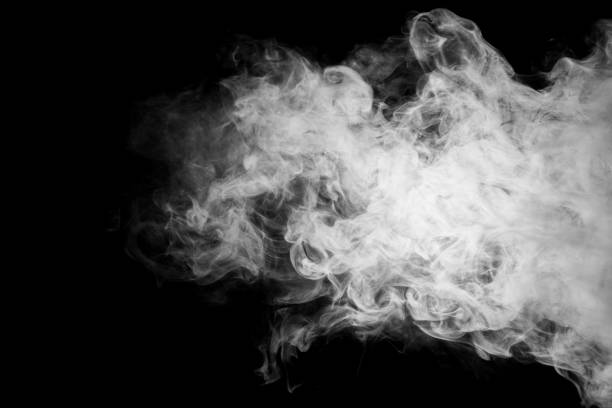 istock close up of steam smoke on black background 801352630