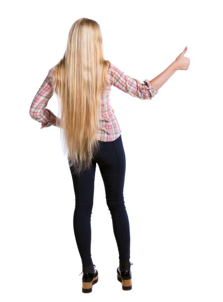 istock Back view of  woman thumbs up. 801352638