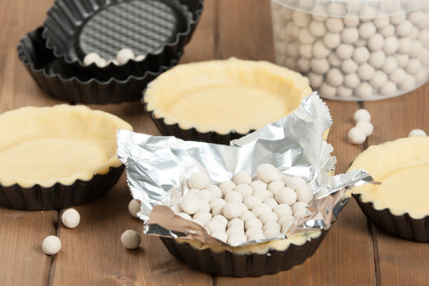Isolated Homemade Apple Pie in Foil Pan with Golden Crust