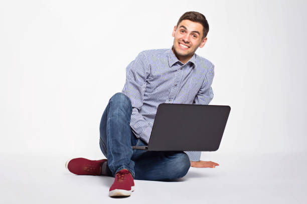 istock Business man with a laptop on a white background 801359292