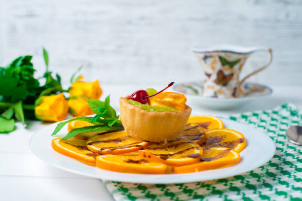 Delicious cupcakes on a wood tabletop.