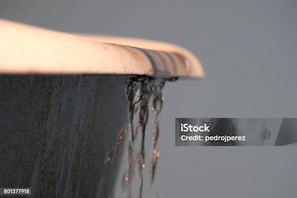 Water Spilling Over A Bathtub Stock Photo - Download Image Now - Overflowing, Bathtub, Water