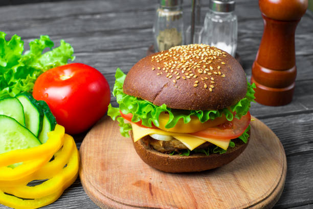 istock Homemade hamburger with fresh vegetables 801380180