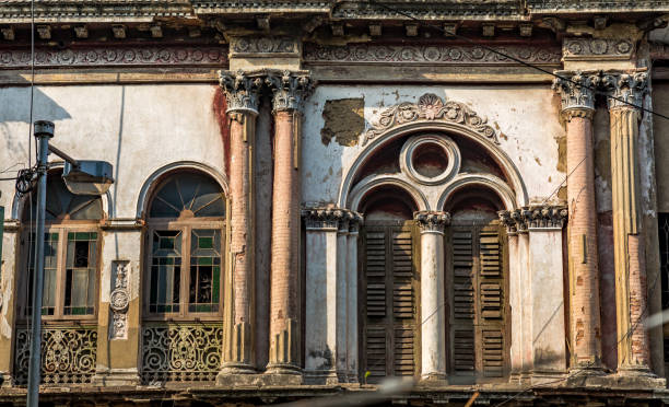 istock Old ancient building exterior built in colonial style architecture for background contents. 801386370