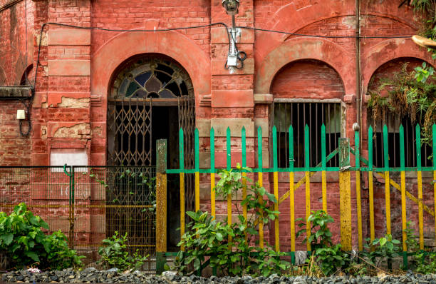 istock Old ancient building exterior built in colonial style architecture for background contents. 801386480