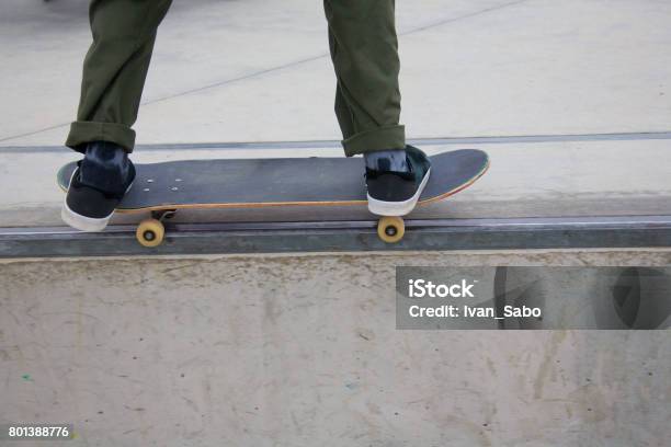 Skateboarder Grinding A Rail At Venice Skate Park Stock Photo - Download Image Now - Skateboard Park, Venice - California, Beach