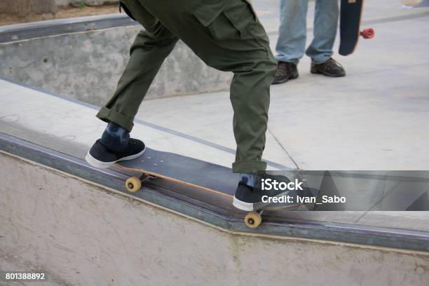 Skateboarder Grinding A Rail At Venice Skate Park Stock Photo - Download Image Now - Beach, Bowl - Skateboard Park, Boys