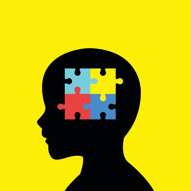 Children Head Silhouette With Autism Icon Children head silhouette with colorful jigsaw puzzle symbolizing autism puzzle silhouettes stock illustrations