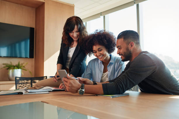 istock Group of diverse businesspeople using digital tablet 801396802