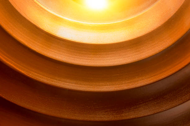 Intricate red, orange, red  and brown abstract, ripple metallic design