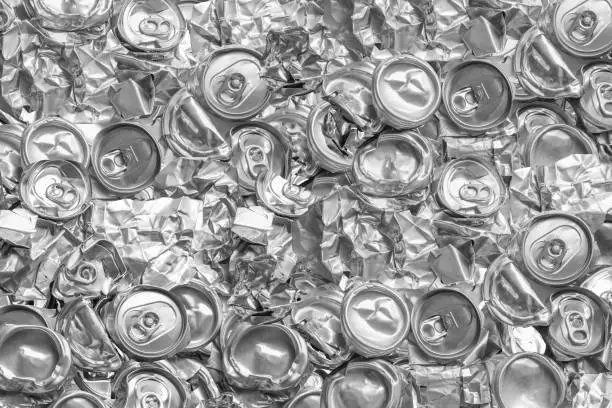 Photo of Aluminium recycling is scrap aluminium can be reused in products, abstract wallpaper, Recycle reuse and reduce concept save the earth, Industry background.