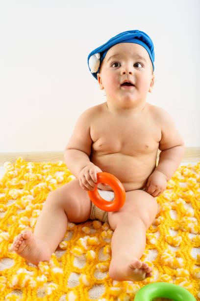 istock Baby playing with toys 801419806