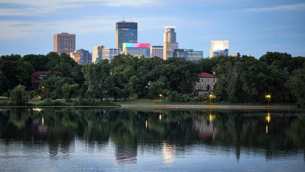istock Gay Pride rainbow lights on Minneapolis skyscraper at sunset. 801466046