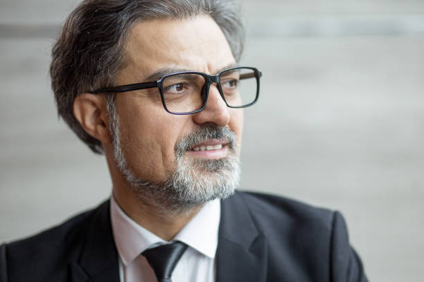 istock Intelligent handsome entrepreneur in glasses 801551572