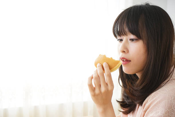 istock Young woman having a breakfast 801569286