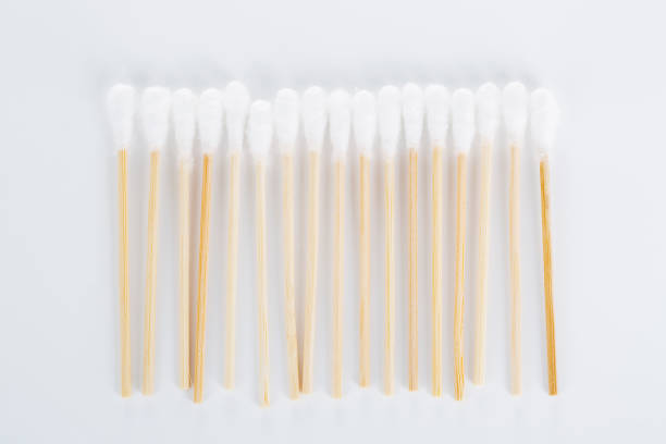 istock High Angle View Of Cotton Swabs On white background. 801602898
