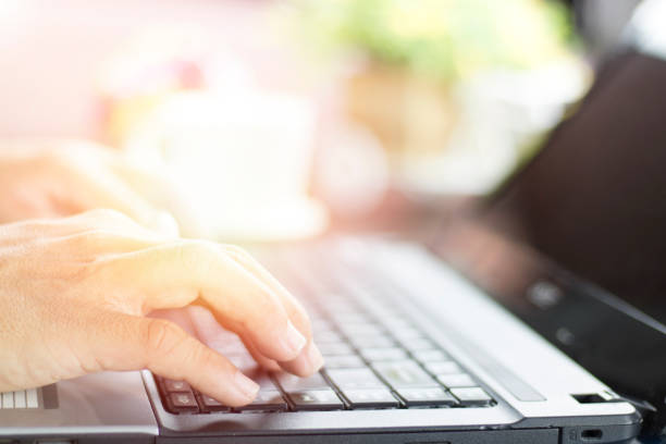istock Businessman typing on keypad  at coffee shop 801605612
