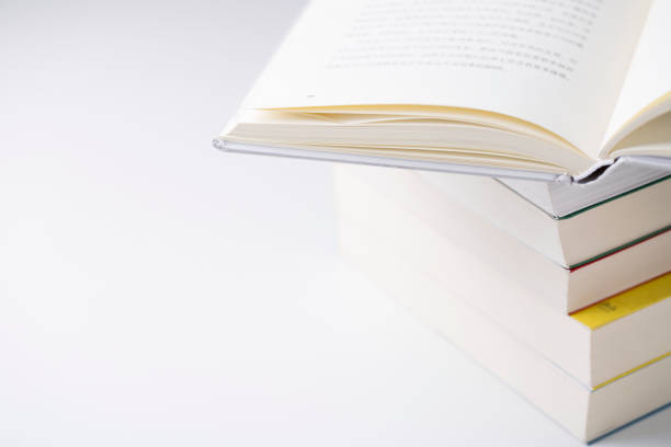 istock Book on table and one open book on the top. 801608204