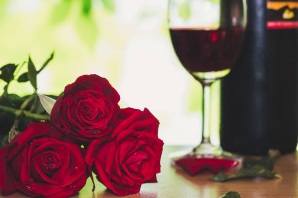 istock bright Red Rose and wine glass for Valentine's Day 801647538