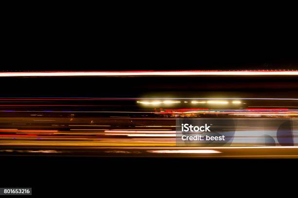 Abstract Traffic Trail Light On The Road Blurred Stock Photo - Download Image Now - Headlight, Lighting Equipment, Speed