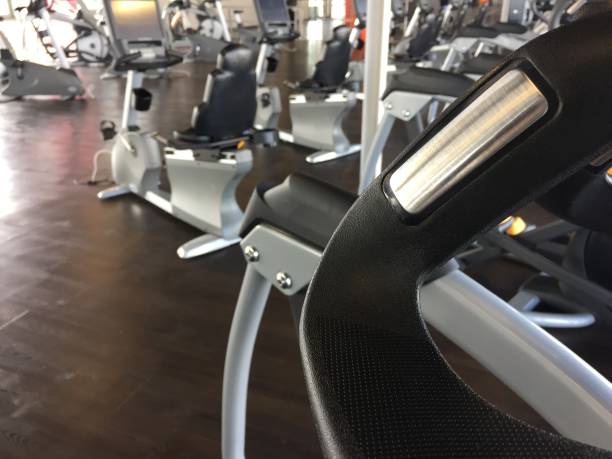 istock Gym center: gym equipment in a weight room. Details. Selective focus 801674360