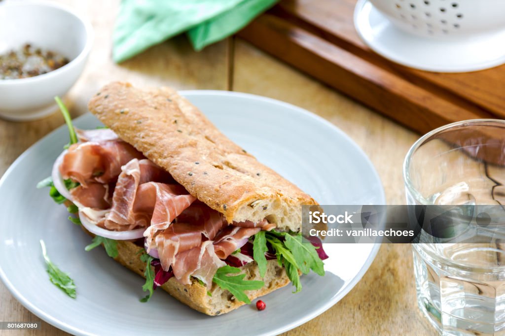 Prosciutto with Rocket and Radicchio on Wholegrain Sandwic Prosciutto with Rocket and Radicchio on Wholegrain Sandwich Sandwich Stock Photo