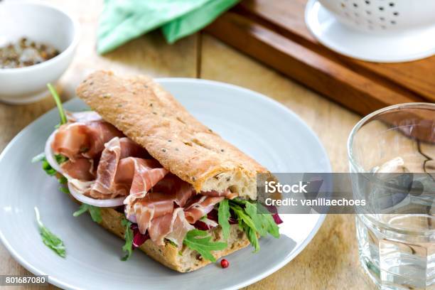 Prosciutto With Rocket And Radicchio On Wholegrain Sandwic Stock Photo - Download Image Now