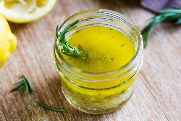 rosemary and garlic lemon vinaigrette - food vegan food gourmet vegetarian food imagens e fotografias de stock